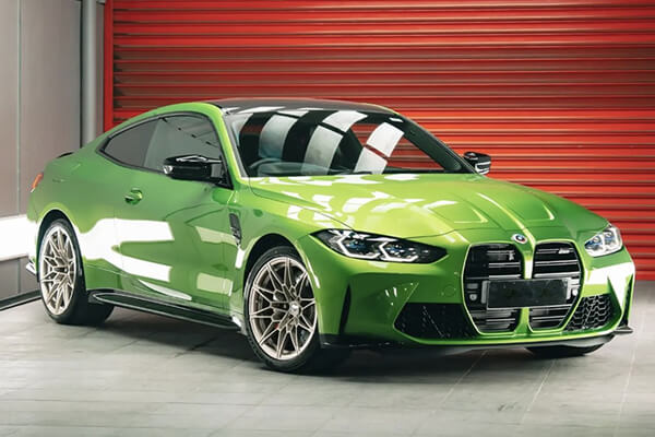 Clear paint protection film on green car1