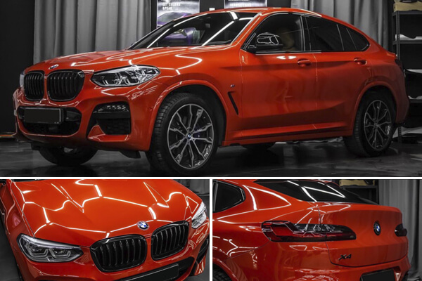 Clear paint protection film on red car